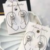 Golden and silver earrings