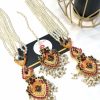 Nauratan earrings and bindya ruby with saharay