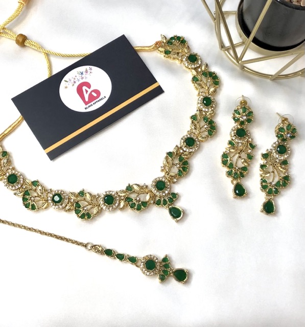 Zircone set golden and green