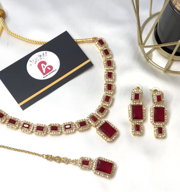 Zircone set golden and red