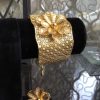 Golden cuff with ring