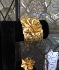 Golden cuff with ring