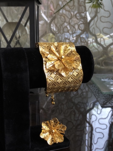 Golden cuff with ring