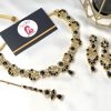 Zircone set golden and black