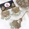 Kundan earrings and bindya mint