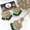Kundan earrings and bindya green