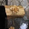 Golden hand cuff kara with ring