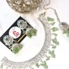 Kundan and zircone set mint and silver