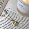 Stainless steel rotating necklace