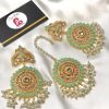 Nauratan earrings and bindya mint