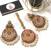 Nauratan earrings and bindya pink