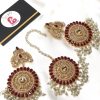 Nauratan earrings and bindya mehroon