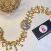 Golden kundan paranda with tassel