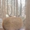 Golden oval clutch