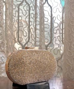 Golden oval clutch
