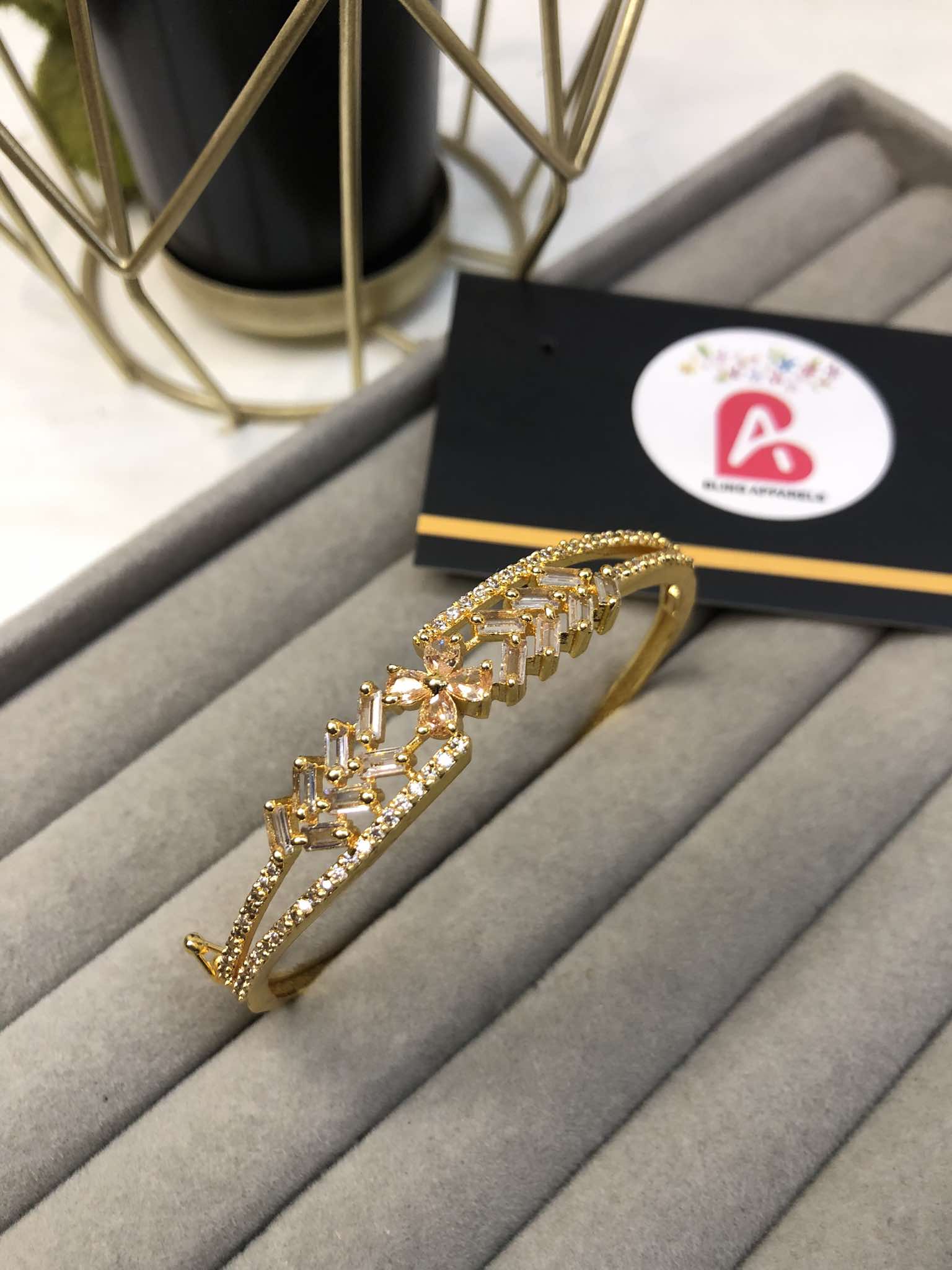 Sleek design golden and champagne Zircone kara