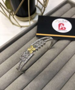 Sleek design silver and yellow Zircone kara