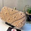 Embellished golden clutch