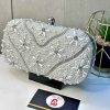 Embellished pearl clutch