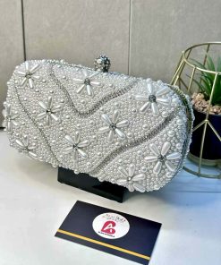 Embellished pearl clutch