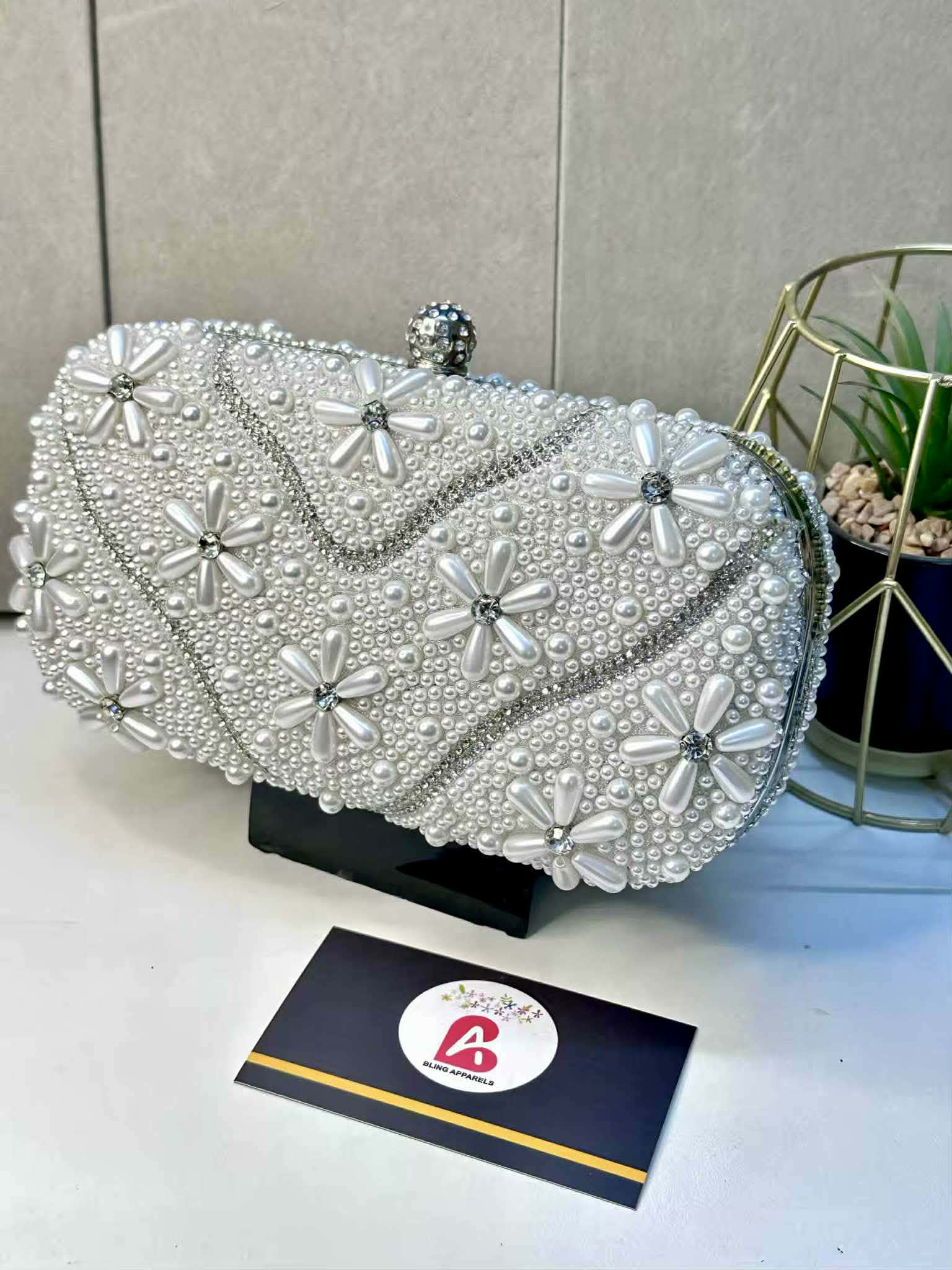 Embellished pearl clutch