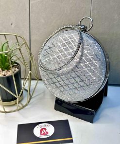 Embellished round clutch