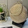 Embellished round clutch