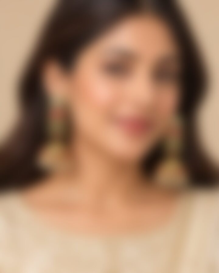 Green Nauratan Jhumka Earrings worn view